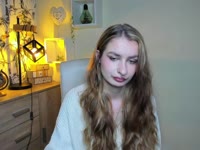 Hey, I’m Nina – blonde hair, green eyes, and tattoos that love to tell their own stories. My taste in music? Somewhere between Doja Cat’s groove and Rammstein’s fire ? I adore singing, dancing, and just vibing with the right energy. Sometimes I’m your sweet daydream, sometimes your wild rock chick – depends on which song is playing ?